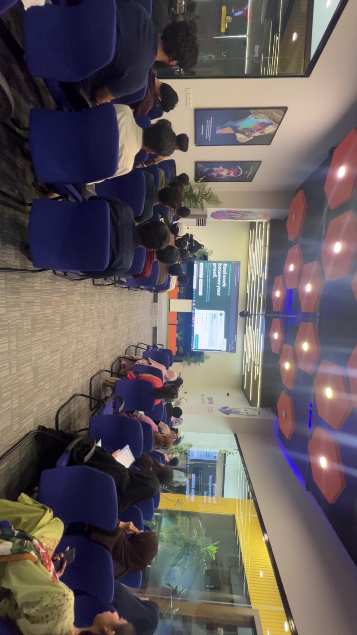 A view from the back of the room during the SM Intern Connect presentation